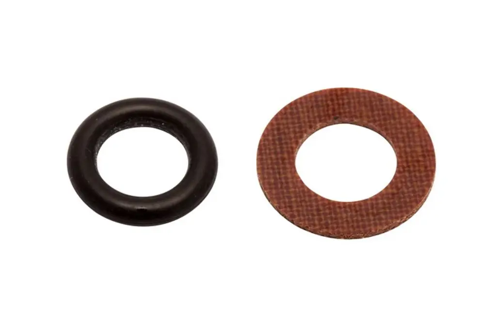 O-Ring und Stützscheibe in unterschiedlichen Materialien, geeignet für Ventile. Teile aus der Produktlinie von IMI Hydronic Engineering.